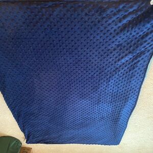 Blue weighted blanket for baby.